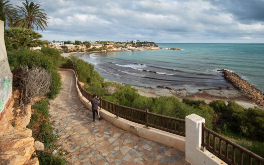 What attractions and why is it worth buying a property in Orihuela Costa?